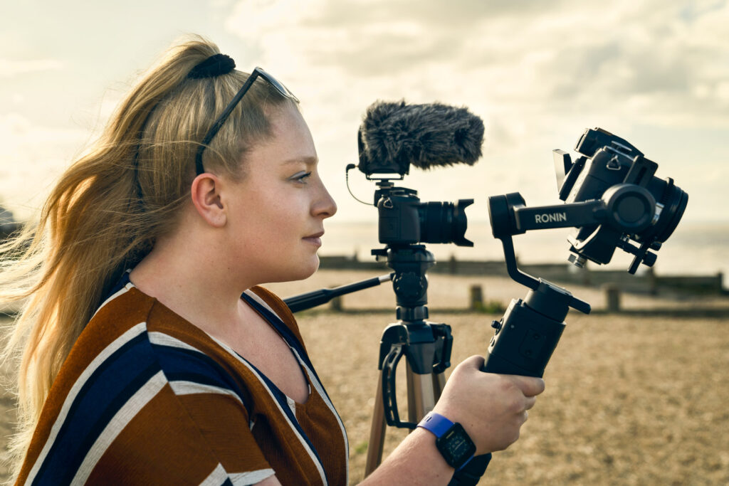 Videographer-at-work-on-beach